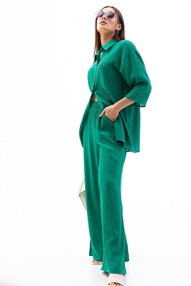 Купить зеленый женский летний костюм - фото